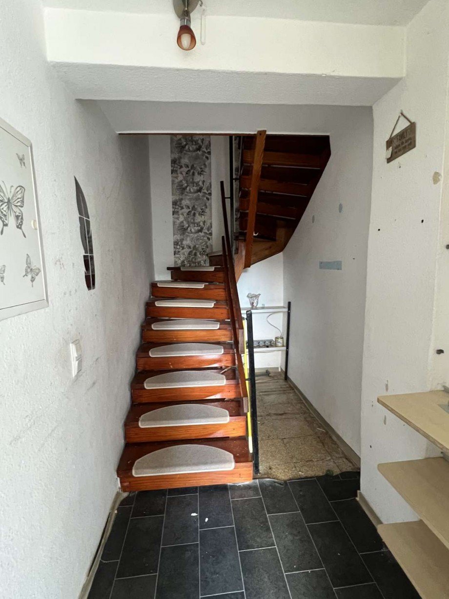Treppe zum OG Renditeobjekt Obermoschel