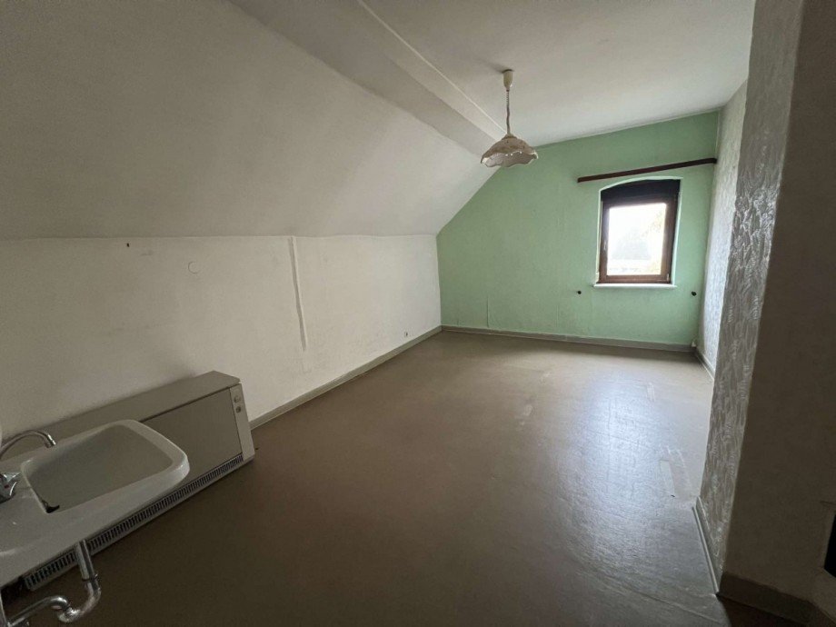 Schlafzimmer im DG Einfamilienhaus Feilbingert