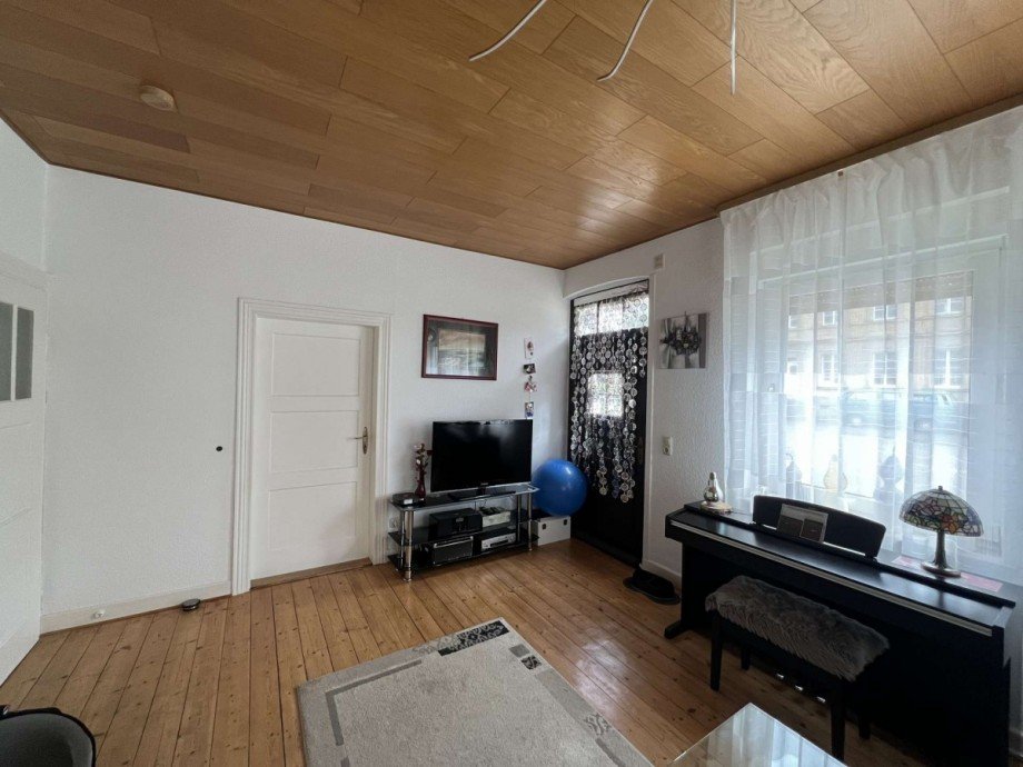 Wohnzimmer im EG mit Hauseingangst�r Haus Staudernheim