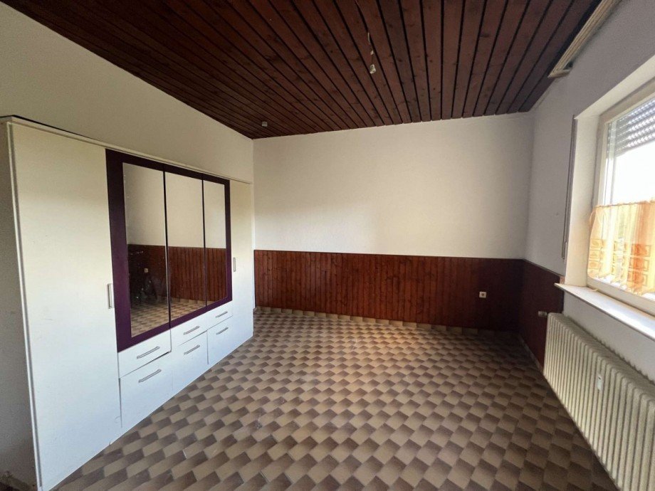 Schlafzimmer EG 3 Zimmerwohnung Mehrfamilienhaus Becherbach