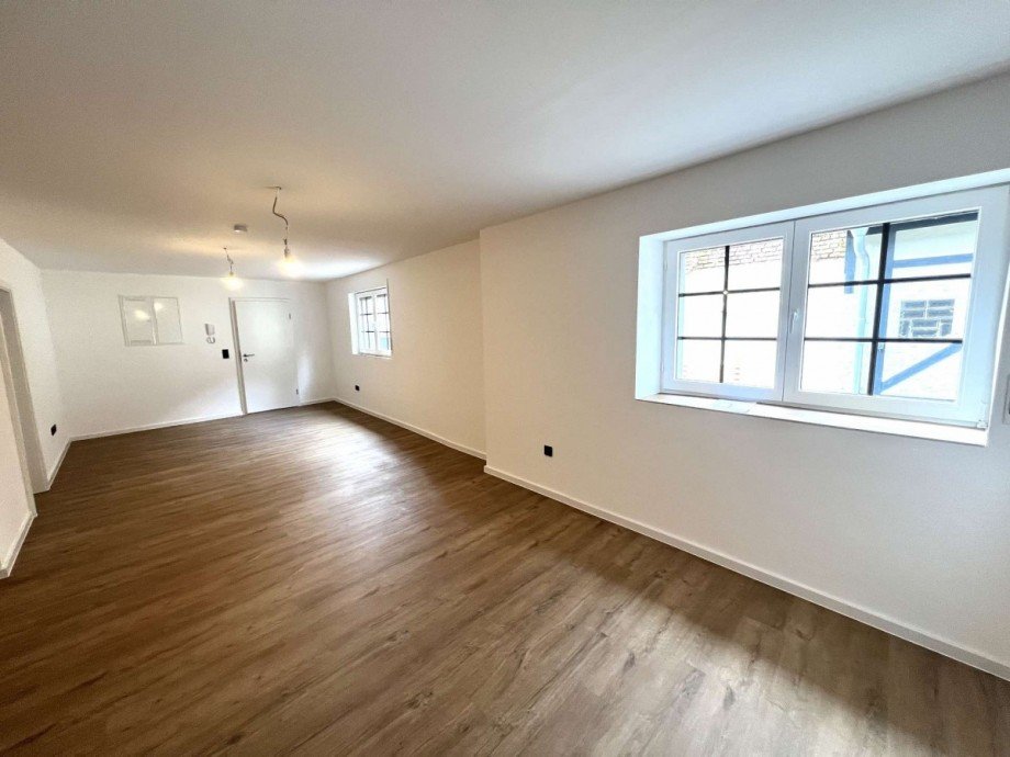 Wohn- und Esszimer EG Hinterhaus Zweifamilienhaus Nu�baum