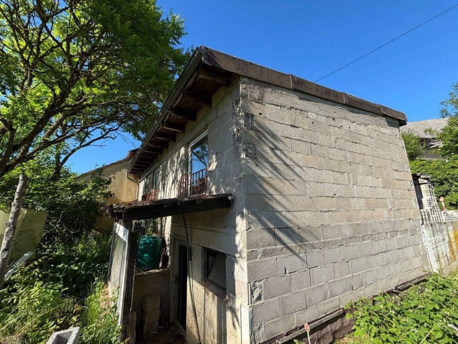 R�ckansicht Garage Mehrfamilienhaus Callbach